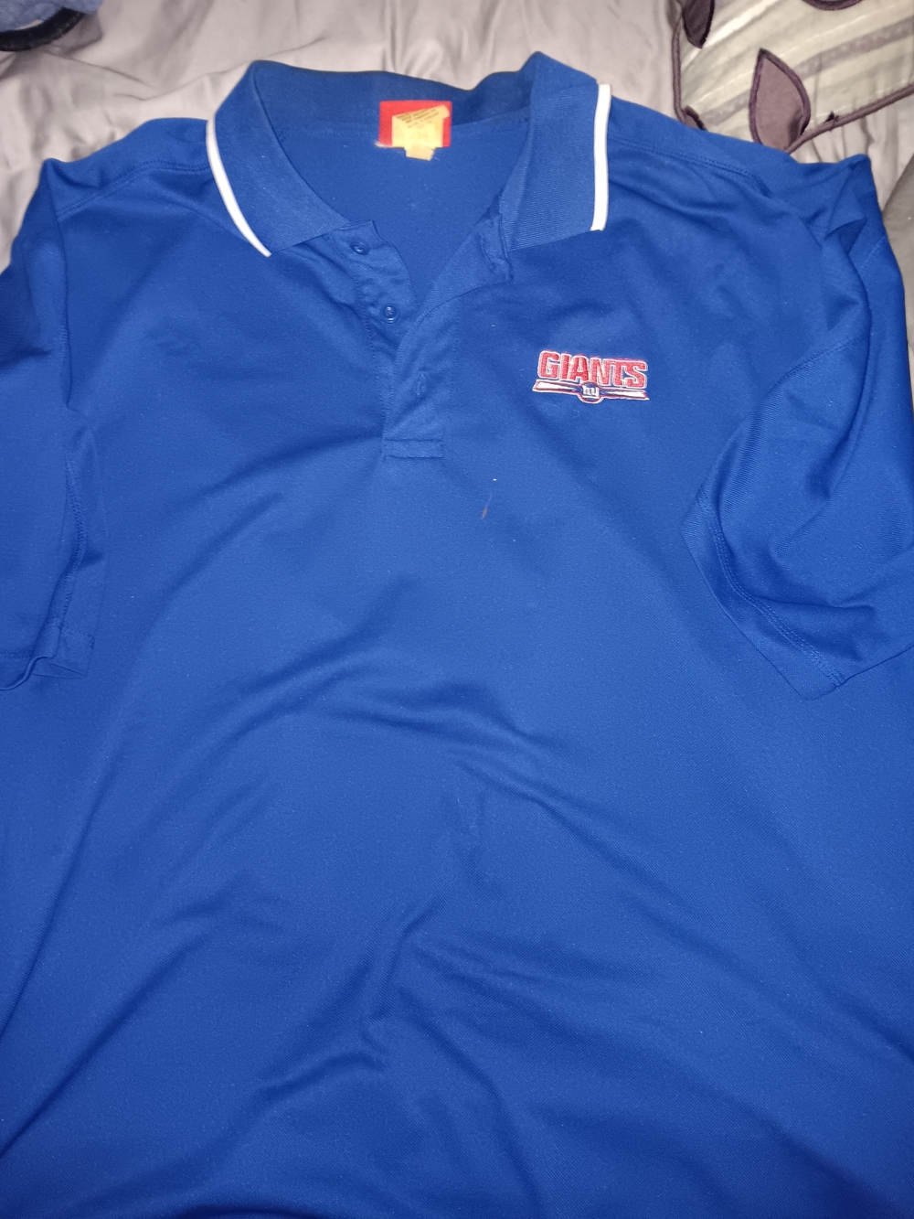 NFL Men's Offical Sideline Polo with White Collar Trim and 'Giants' Logo